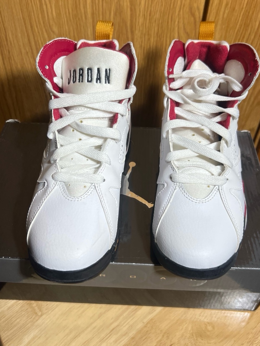 Jordan Kids White High-Top Sneakers with Pink Lining and Yellow Heel Tabs
